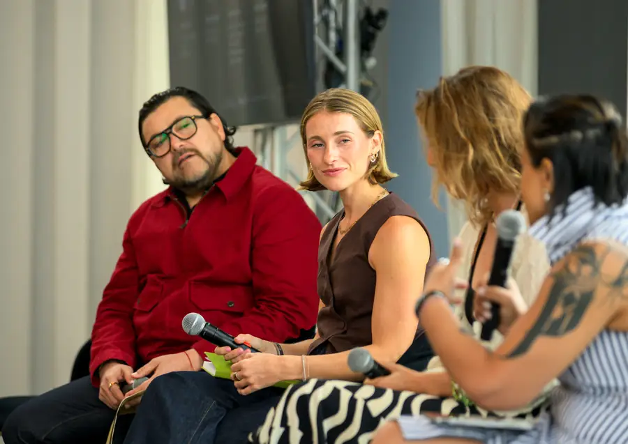 Speakers mid-conversation during The Places That Connect Us.